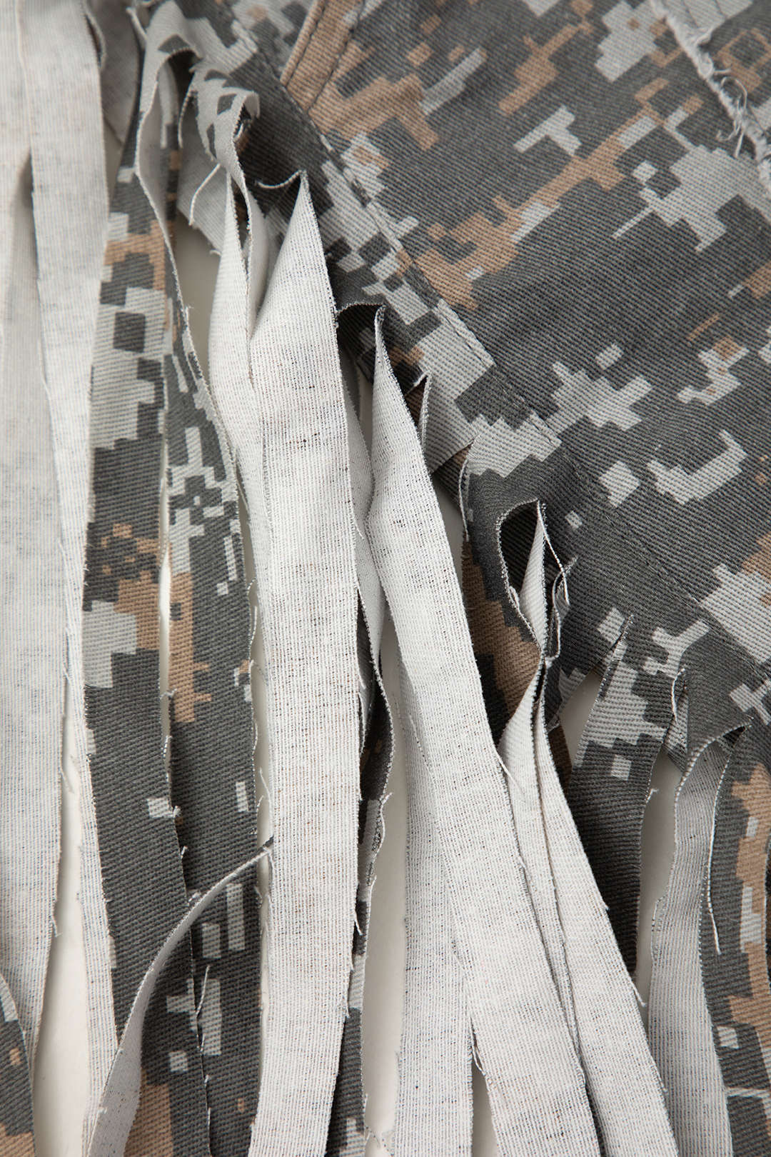"Camo Frayed Patchwork Fringe Mini Skirt"
