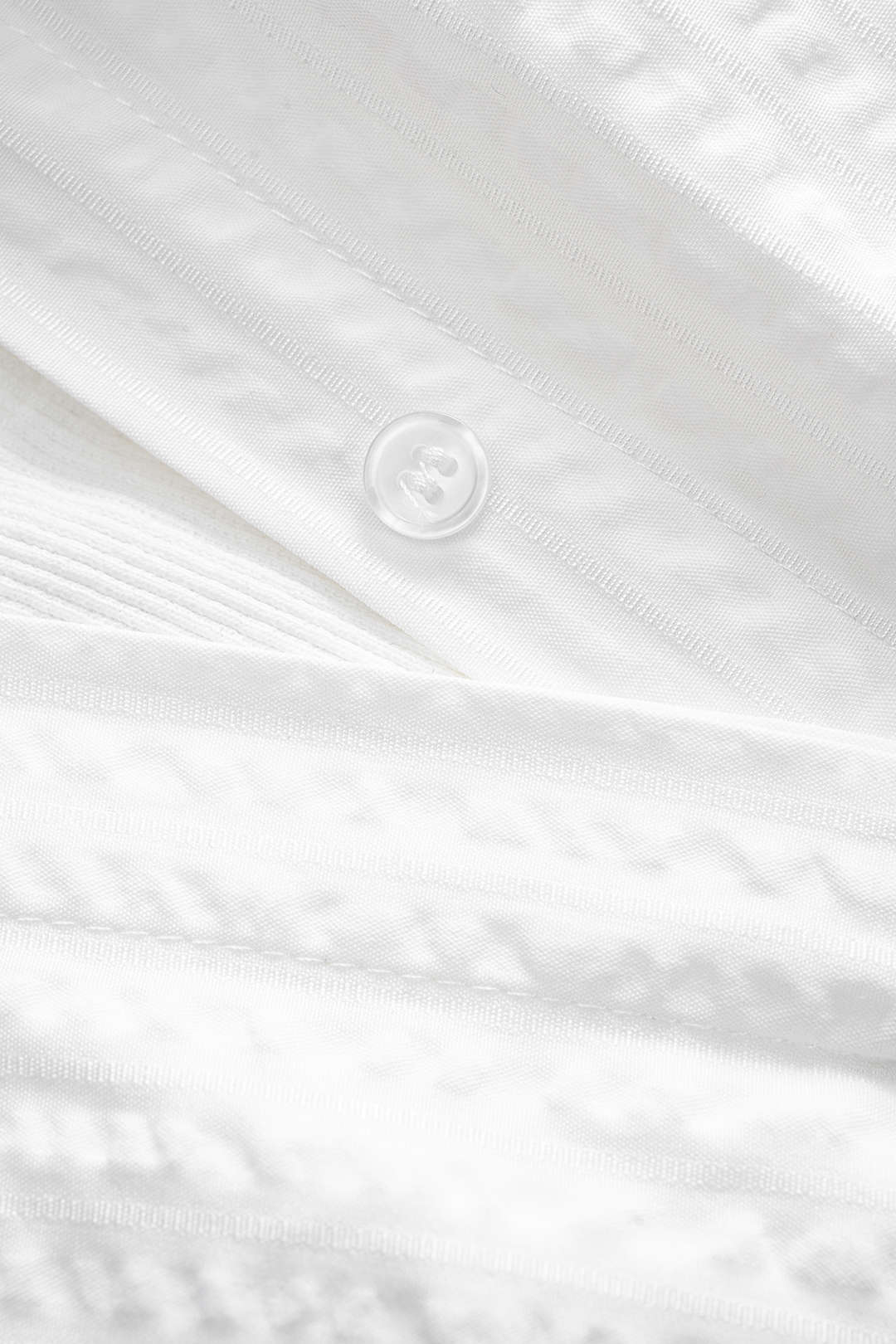 "Button Detail Cut Out Long Sleeve Bodysuit"