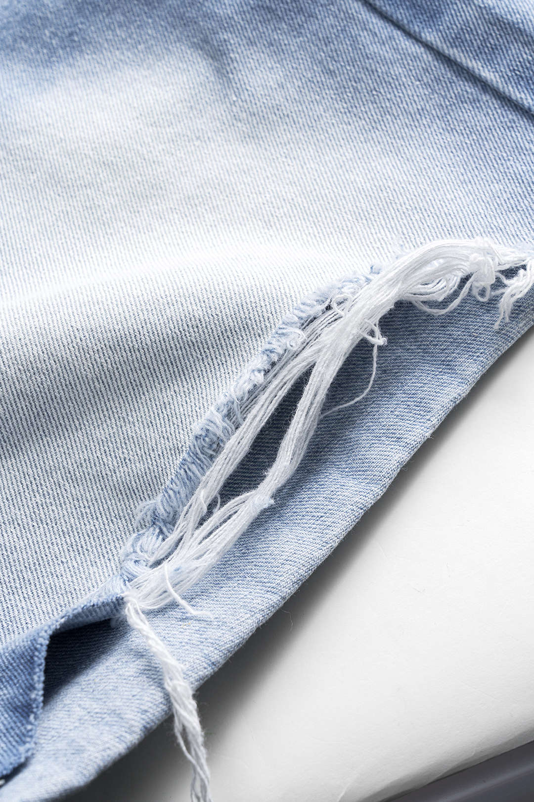 "Denim Asymmetrical Button Pocket Ripped Shorts"